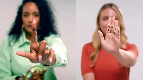 The photo shows Amy and Roxy with their left hand up to the camera. The words "MS" and "Must Stop" are written on their hands.