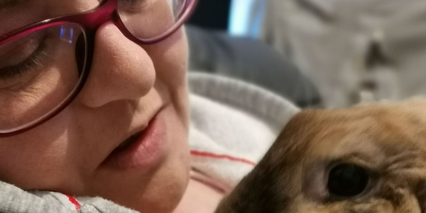 Binky the Bunny being held