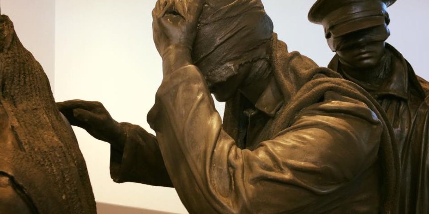 Detail of bronze soldiers sculpture