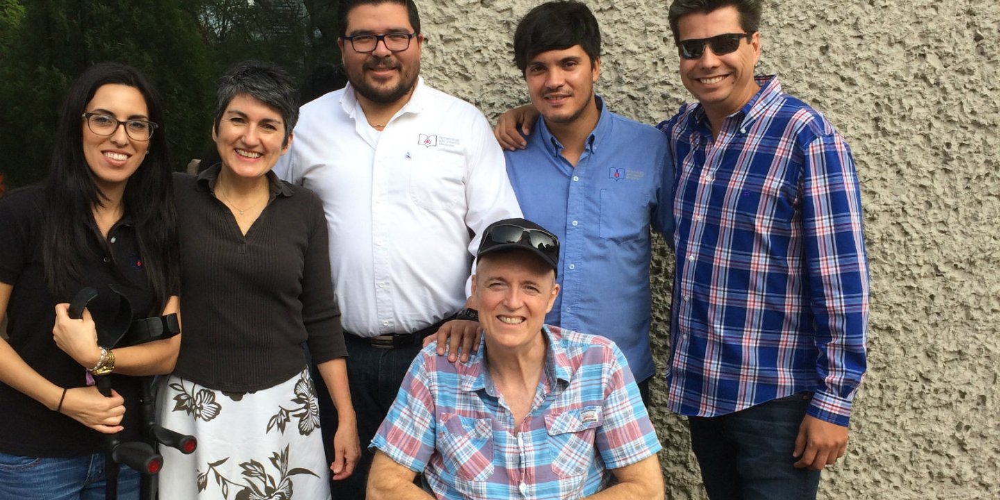 Photo of Miles, his wife, and the HSCT team in Mexico