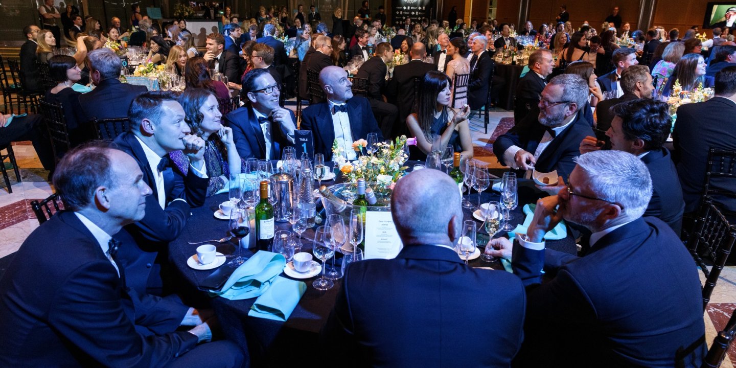 A table of guests at SMS Battles. Photo copyright Brendan Foster 