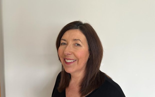 Headshot of Sheenagh McVeigh, who has shoulder length dark hair.