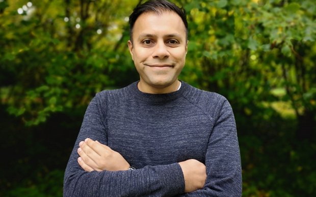 Headshot of Jason Jaspal in front of some trees