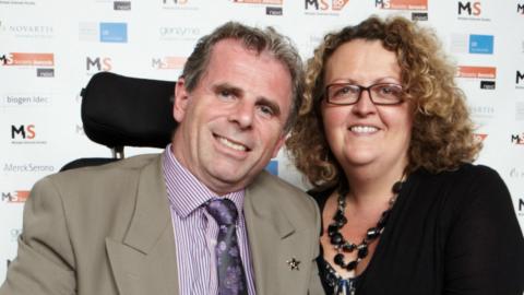 Photo shows MS Society Ambassador Stuart Nixon with his wife Marie at the MS Society Awards