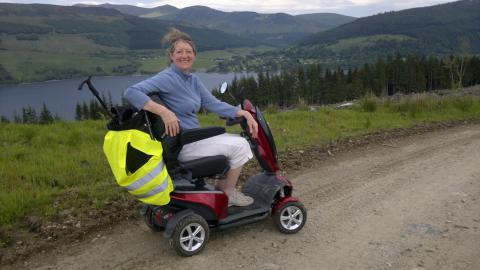 Barbara Hogarth with her mobility scooter