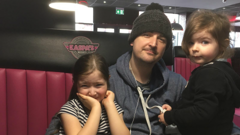 Dave with his two daughters
