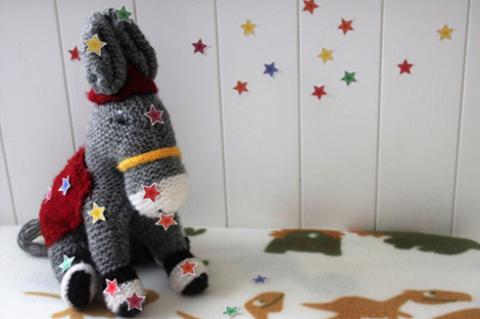 a toy Donkey with stars