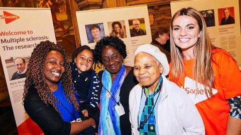 Photo shows Rebecca (who has MS), her son, her mum, Mrs Balchin and our senior campaigner Emma Vasey in Westminster at our Stop MS exhibition