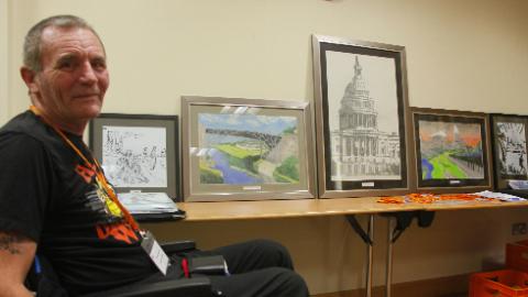 Mike with some of his drawings