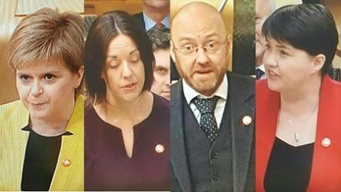 A photo of 4 Scottish party leaders wearing badges to pledge their support to our campaign
