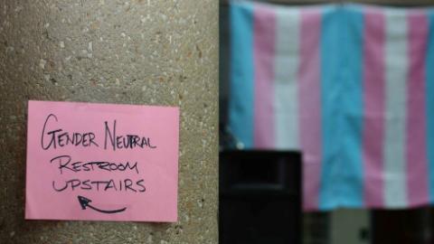 Photo: A sign for a gender neutral bathroom