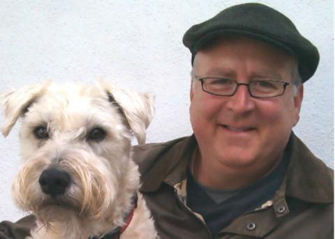 Trevis Gleason and his dog