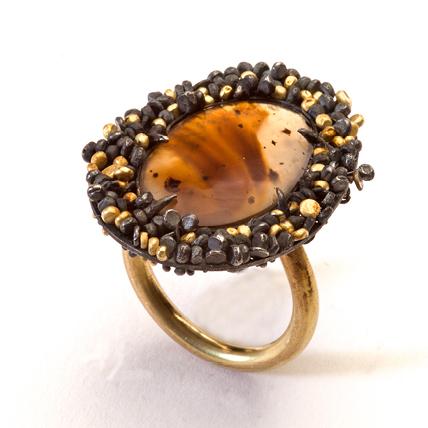 COSMOS II - An oval Antique agate backed with moon gold leaf; 18 carat gold; oxidised silver