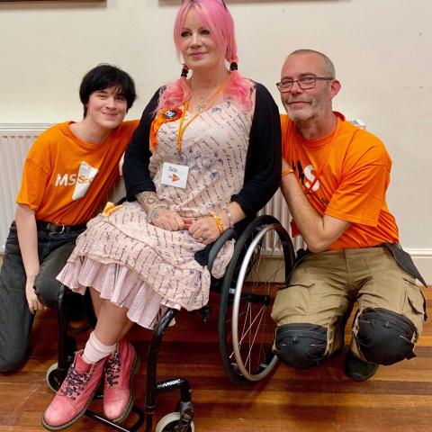 Soo with pink hair with two people in MS Society t-shirts