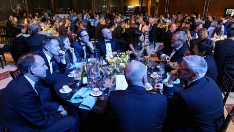 A table of guests at SMS Battles. Photo copyright Brendan Foster