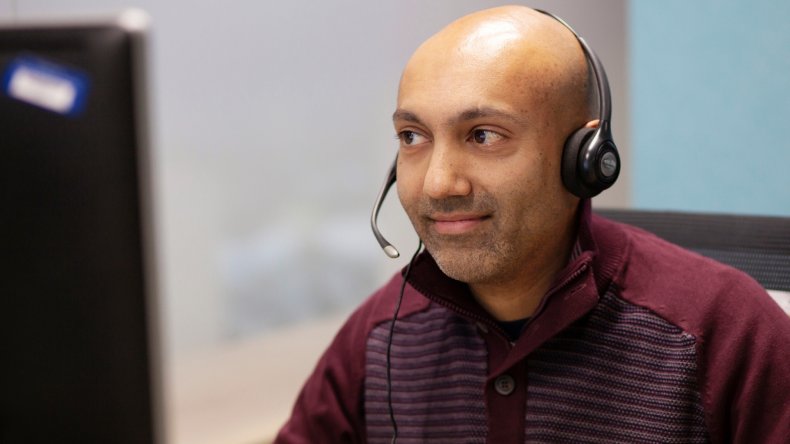 MS Helpline officer wearing a headset
