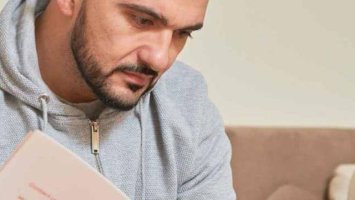 Applying for PIP - Men reading