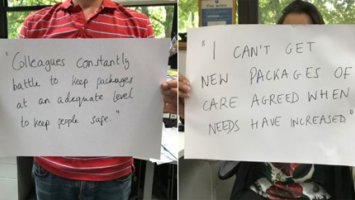 Campaigners hold up signs expressing their frustration about the devastating impact that cuts are having on people who rely on social care and support.