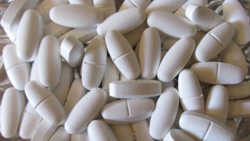 White vitamin pills