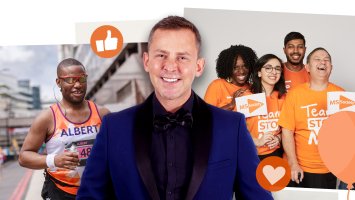 Photo of Scott Mills in front of MS Society volunteers and a runner
