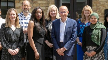 Group photo of MS Society Trustees outside on a sunny day