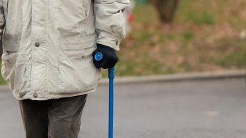 Close up of someone using a mobility aid 