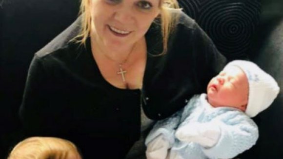 Lynn with two children