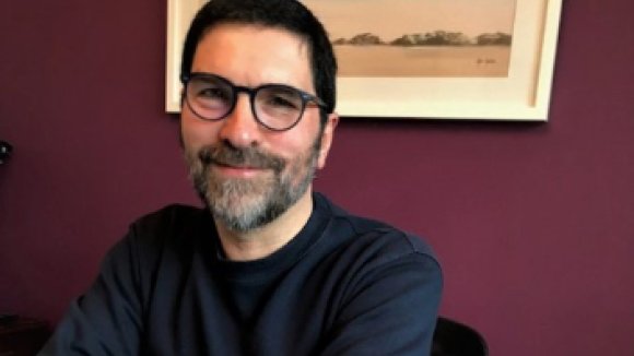 Martin Baum smiling at camera