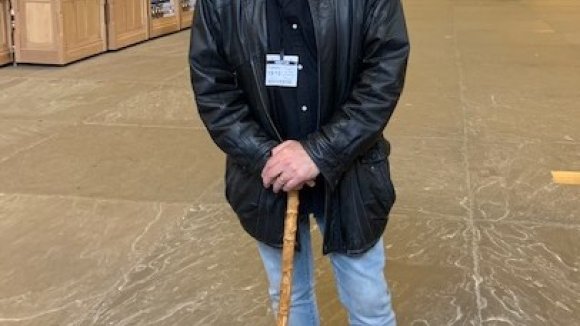 Martin at parliament using his walking stick