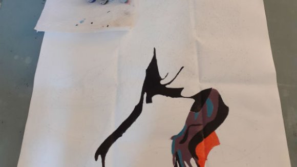 Picture of Rose's paint by numbers T-Rex that she hasn't finished yet.