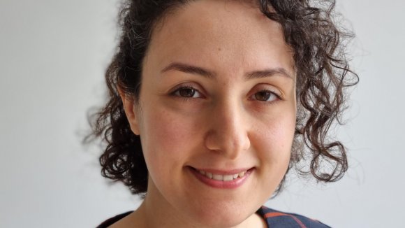 Headshot of Dr Afagh Garjani smiling