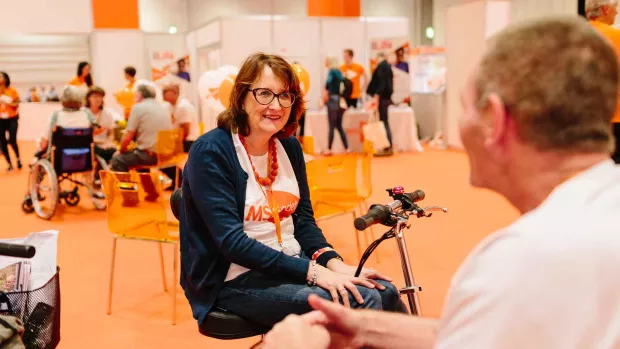 A photo showing People talking at a MS Life event
