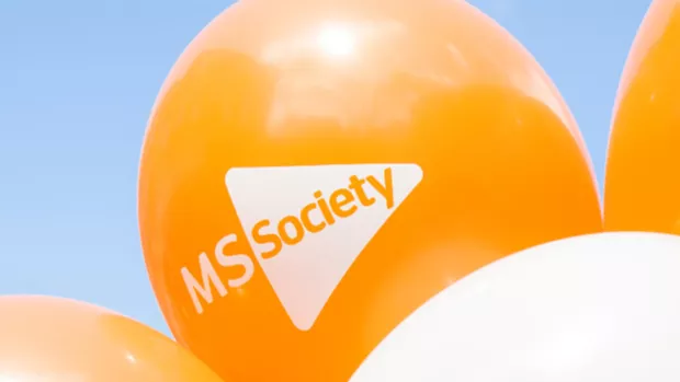 Photo: an orange MS balloon
