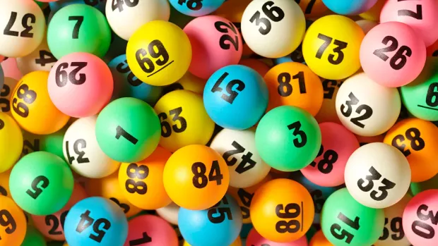 Photo: Some colourful lottery balls with numbers on them