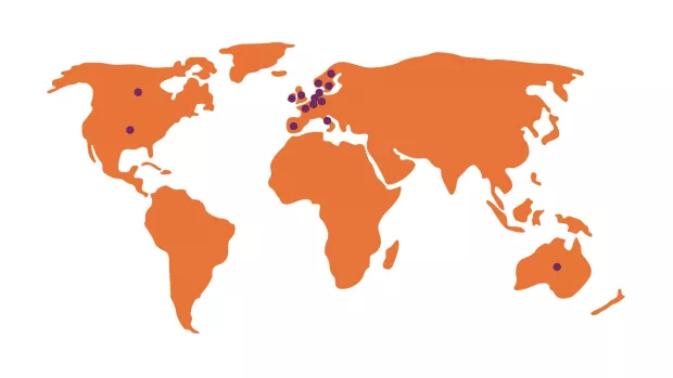 Map of the world in orange with purple dots in Australia, America, Canada, and Europe.