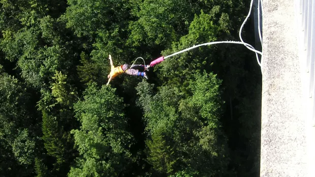 Woman taking part in a bungee jump