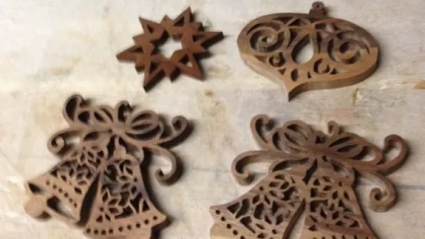 Photo: wooden Christmas decorations with fretwork