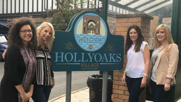Photo shows Kirsty Grice and three friends standing on the Hollyoaks set.