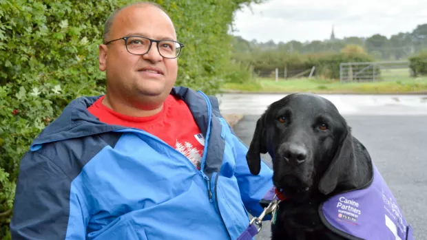 A photo of Majid and his dog