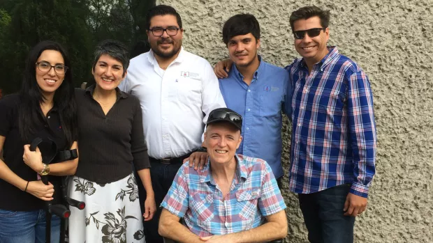 Photo of Miles, his wife, and the HSCT team in Mexico