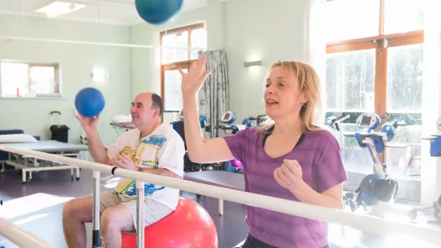 People exercising with balls