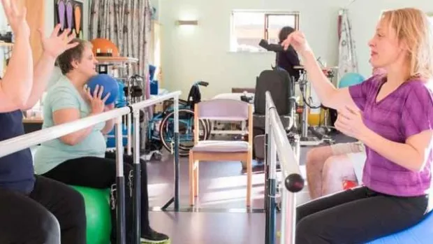 People exercising with balls