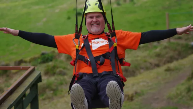 a man on a Zipslide