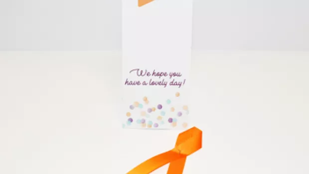 A MS In celebration ribbon badge