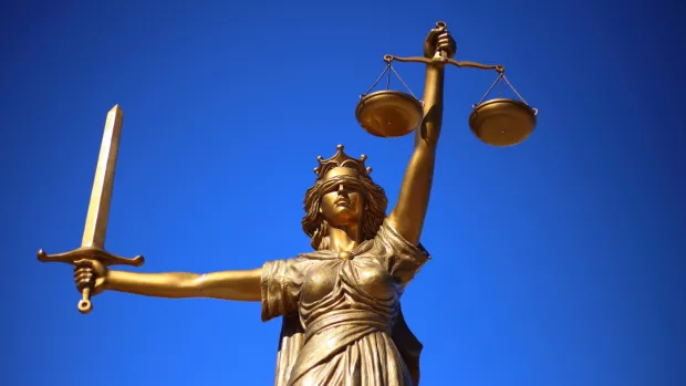 Statue holding sword and scales of justice