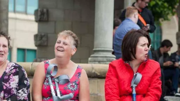 Photo: Newcastle group talking and laughing outside