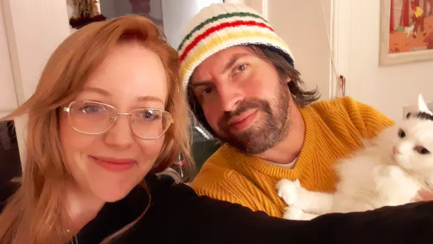 Selfie of Rose with her husband and her cat