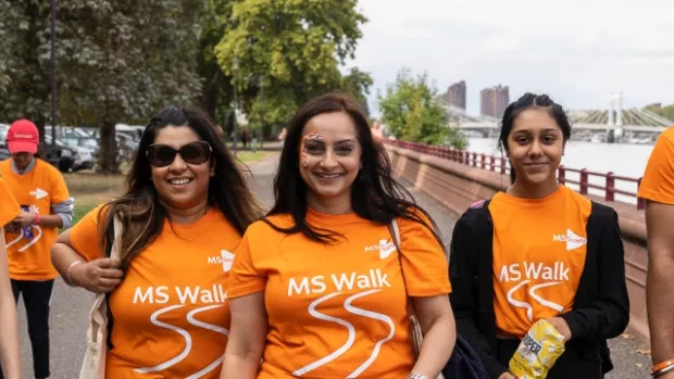 Fundraisers in MS Society t-shirts taking part in MS Walk