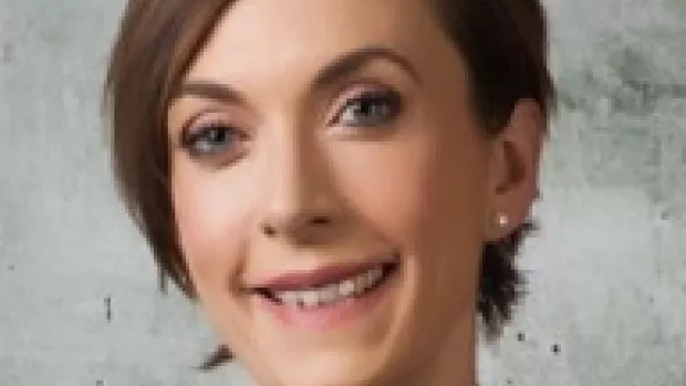 Dr Emma Tallantyre, headshot of a woman with dark bobbed hair parted on the left side