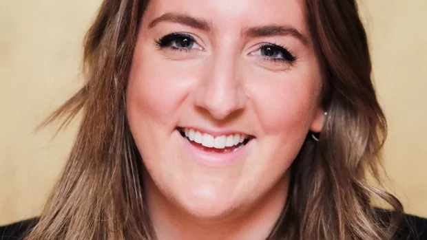 Photo of Emily Revess smiling at the camera